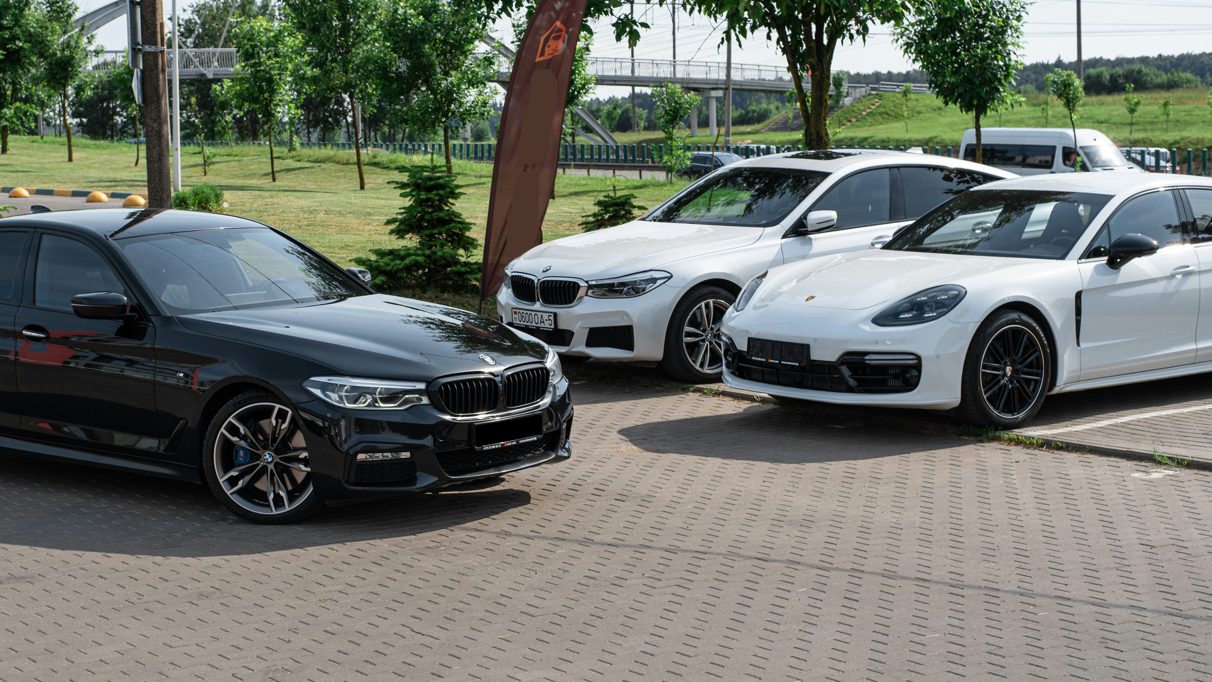 Happy customers at car dealership